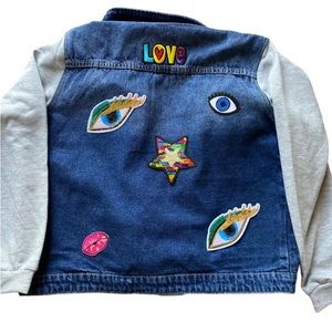 Denim jacket with button closure. New.